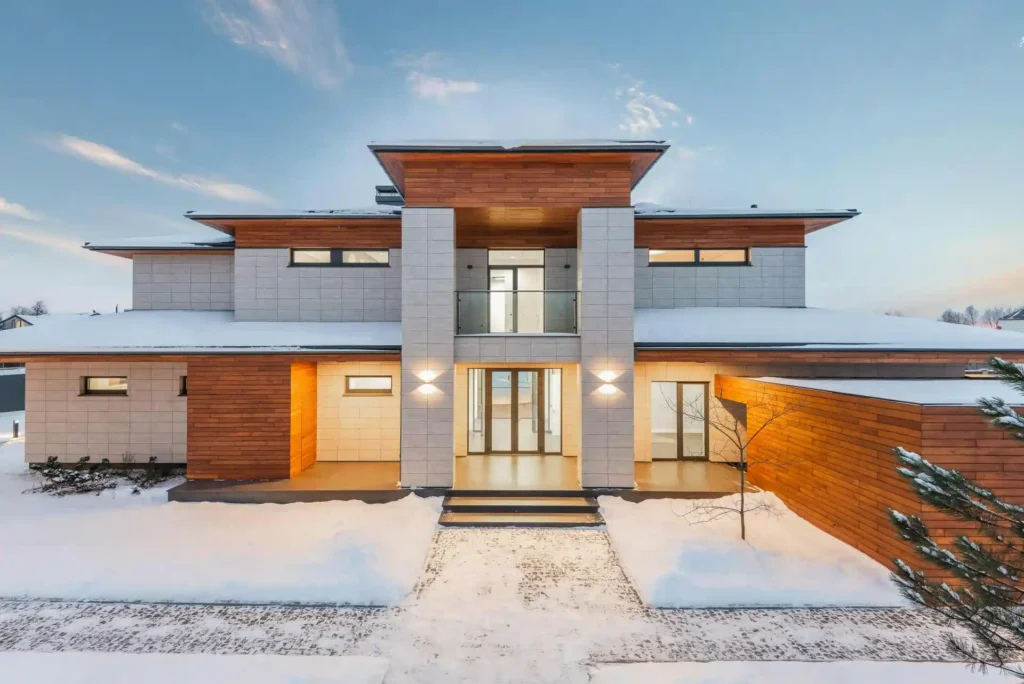 A grand, custom-built modern luxury home, showcasing Blue Mountain Contractors' commitment to exceptional design and quality craftsmanship