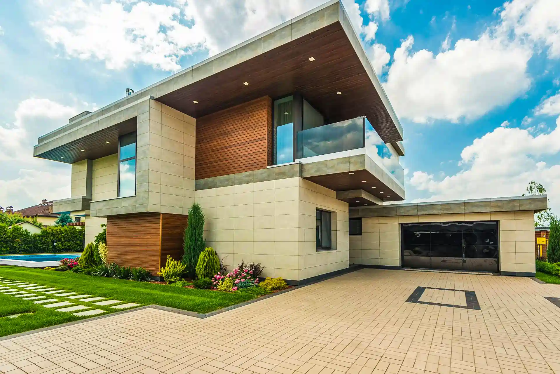 Stunning modern luxury home by Blue Mountain Contractors, featuring sleek design, premium materials, and exquisite exterior craftsmanship