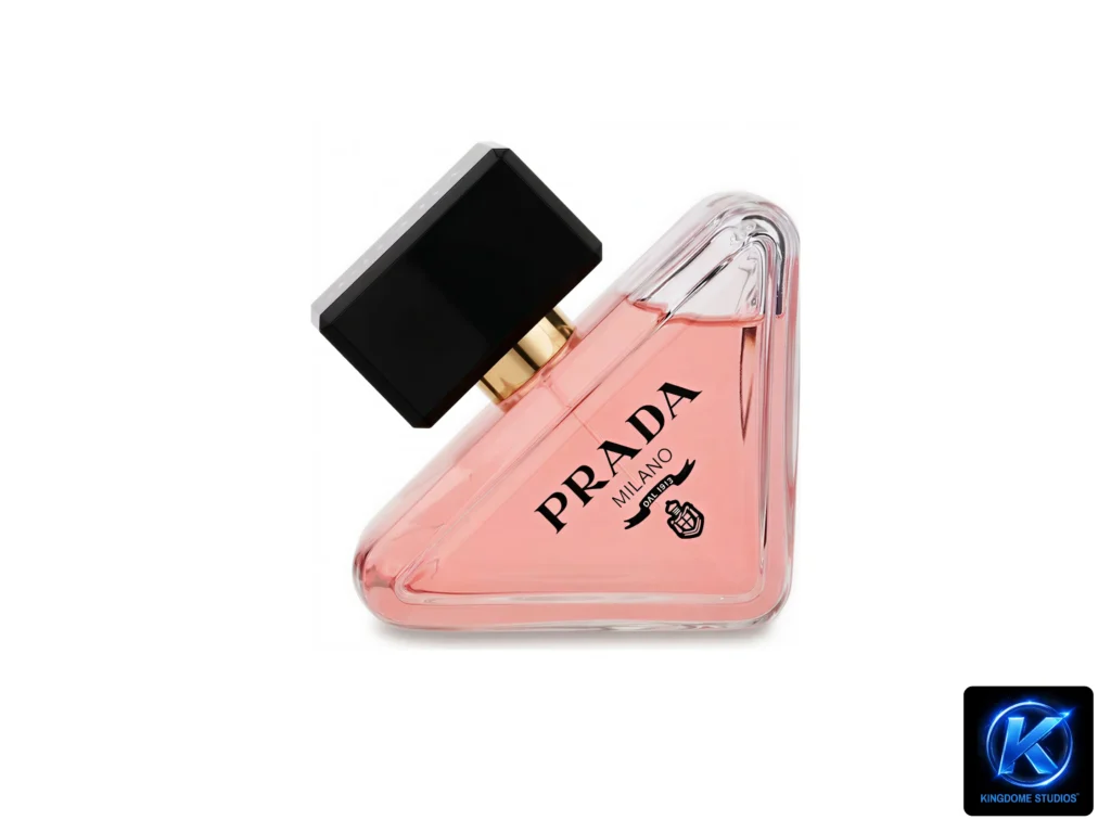 An artistic, high-end studio shot of a triangular Prada Milano perfume bottle with pink liquid and a black cap, expertly captured by The Best White Background Photographer in Abbotsford BC